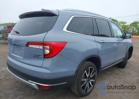 2022 Honda Pilot Touring z USA, uszkodzony, nr VIN 5FNYF6H68NB056077